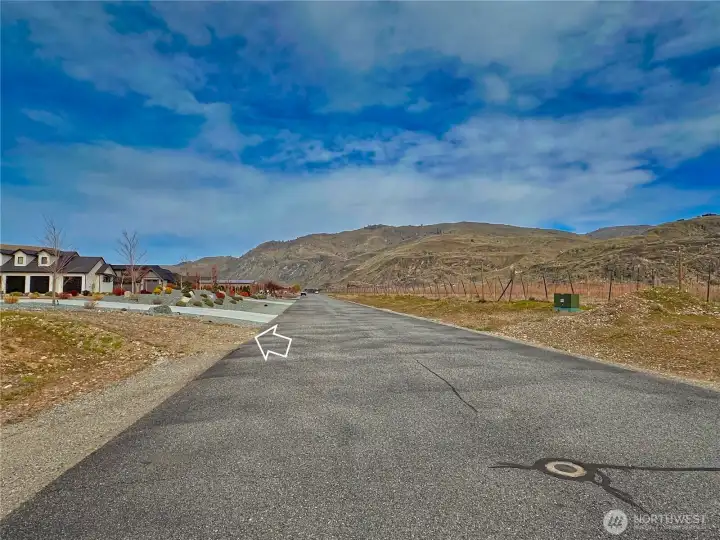 Property entrance and road view towards north of 119 N Shore Dr