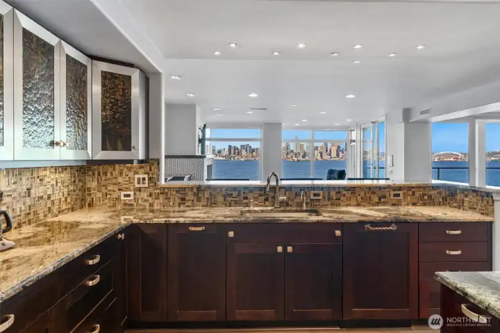 Even everyday moments feel elevated in this wide-open kitchen, where preparing meals or brewing a simple cup of coffee becomes a true pleasure. Surrounded by sweeping, unobstructed views, the space transforms routine tasks into a serene and inspiring experience.