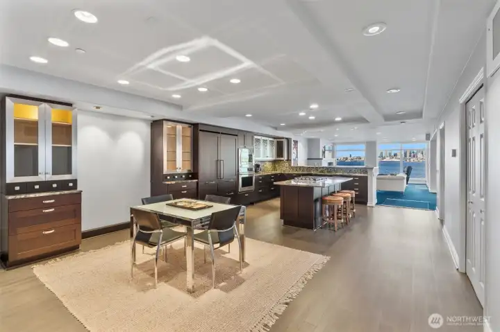 In this view, you’ll notice the casual dining area within the kitchen, offering both versatility and everyday convenience. Alongside the formal dining space, additional seating at two kitchen counters, and generous room on the view deck, this home is perfectly designed for effortless entertaining. From intimate dinners to large holiday gatherings, there’s ample space to host a crowd in comfort while enjoying the stunning surroundings