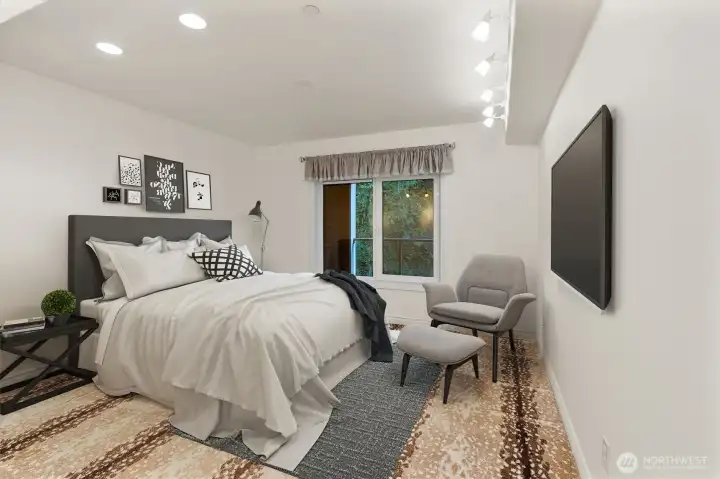 Another of the three bedrooms also enjoys a peaceful orientation toward the serene hillside, offering a quiet, private setting immersed in nature. The gentle outlook creates a calming retreat within the home, ideal for guests, work, or relaxation. This photo has been virtually staged to illustrate potential use and furnishings.