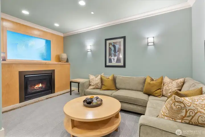 The lobby at Point Elliott offers a warm and inviting atmosphere, providing a gracious setting to welcome guests or connect with fellow residents.