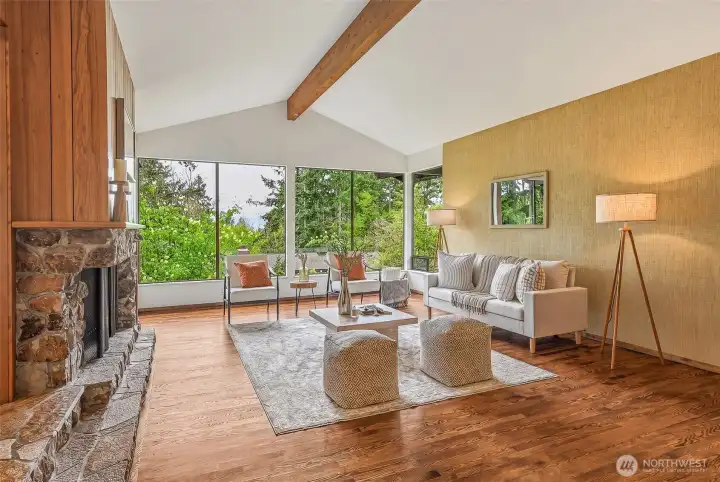Bright entry view showcasing peek-a-boo views of Puget Sound and the Olympic Mountains.