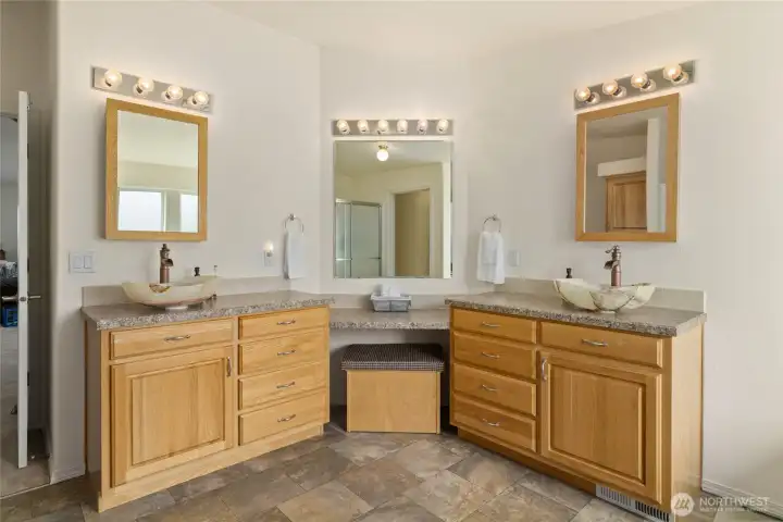 Primary bathroom with custom double sinks.