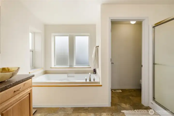 soaking tub in primary bathroom.