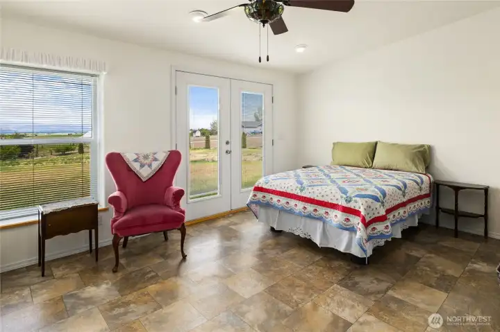 bedroom #3 is extra large with french doors.