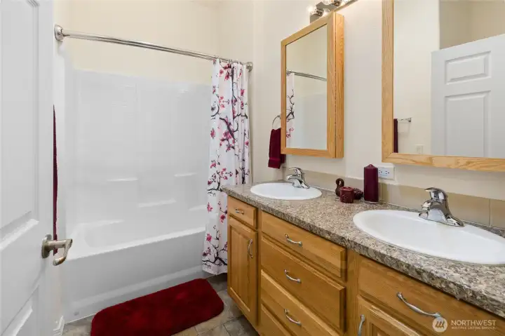 Main bathroom with double sinks.