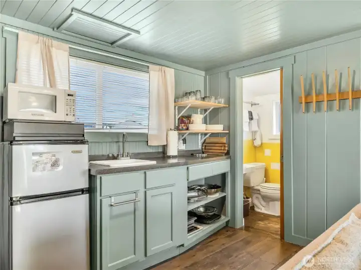 Don't let the size fool you! This kitchen has everything you need and plenty of storage. Don't let the size fool you! This kitchen has everything you need and plenty of storage.