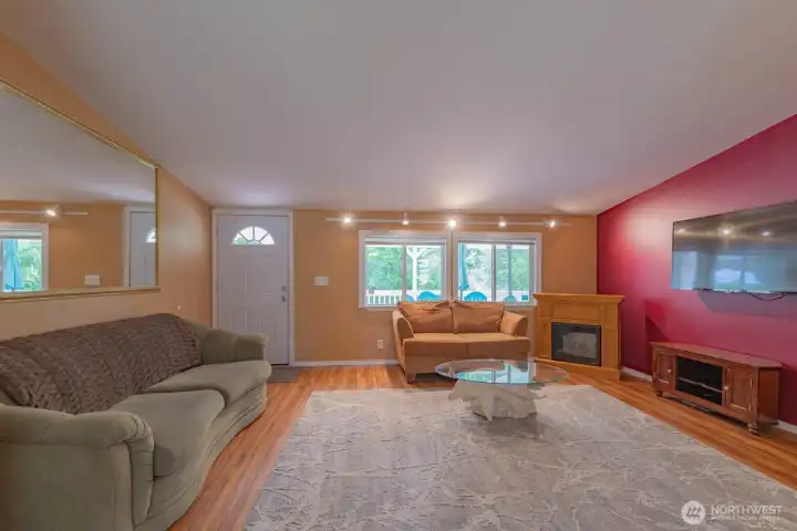 Living Room with an Electric Fireplace and the TV stays Living Room with an Electric Fireplace and the TV stays