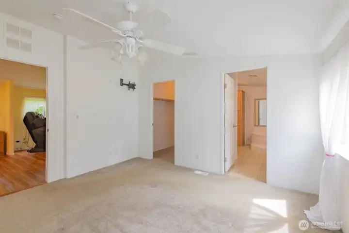 Large Primary Bedroom and closet. Large Primary Bedroom and closet.