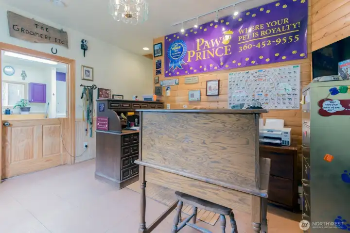 Paw Prince entry lobby and the door to the grooming room. Paw Prince entry lobby and the door to the grooming room.