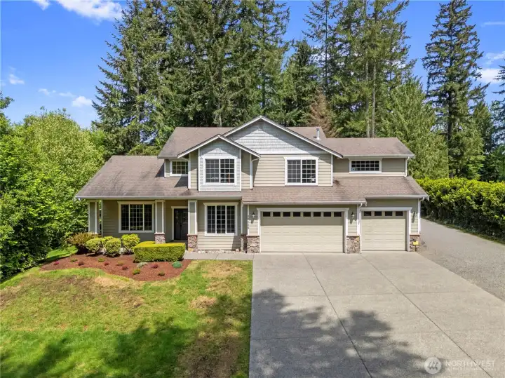 3 car garage with 5 car and/or RV parking on the side.