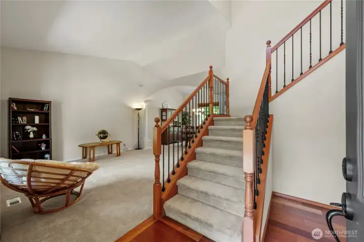Walk into your vaulted entry. Formal spaces to the left.