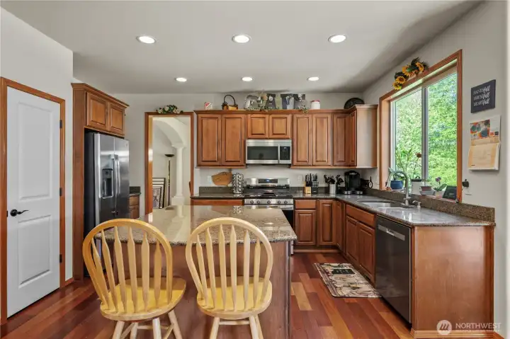That island is huge. Cabinets on both sides have tons of storage.