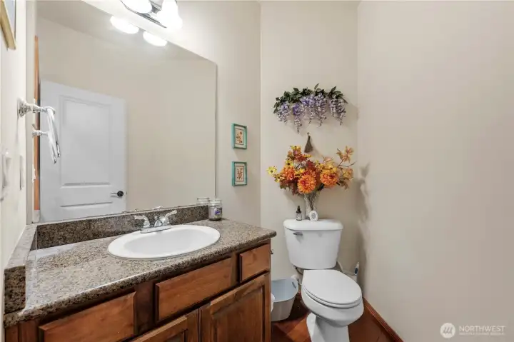 Powder room is tucked away from the festivities and still convenient for your guests.