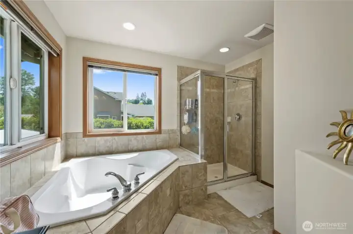 Soak away the day in this oversized tub, or make it a quick shower for getting ready in the morning.