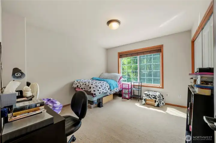 And secondary bedroom #2 also has great space and a big, south-facing window.
