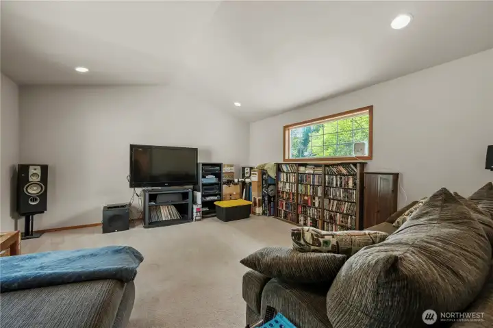 This bonus room- nicknamed "the Big room" is very used to curling up for the movies.
