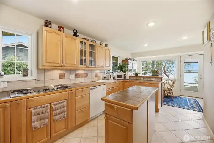 Beautiful bright Kitchen with views of Kayak Point.