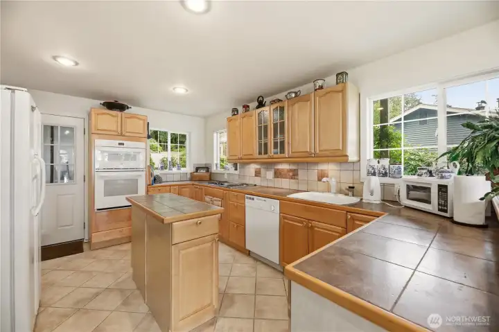 Tile countertops throughout.