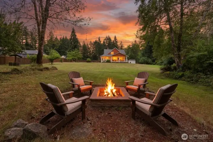 As the sun sets beyond the towering evergreens, gather around the fire pit and experience the peace and privacy that make this property truly unforgettable. Expansive park-like grounds create the perfect backdrop for entertaining, quiet evenings under the stars, and making lifelong memories in your own private Northwest retreat. As the sun sets beyond the towering evergreens, gather around the fire pit and experience the peace and privacy that make this property truly unforgettable. Expansive park-like grounds create the perfect backdrop for entertaining, quiet evenings under the stars, and making lifelong memories in your own private Northwest retreat.