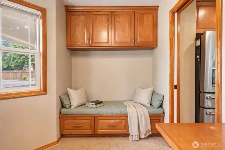 A charming built-in bench with storage adds warmth and function to the office, creating the perfect spot for reading, relaxing, or extra organization. Thoughtful cabinetry above and below maximizes storage while keeping the space clean and inviting, making this office both practical and comfortable. A charming built-in bench with storage adds warmth and function to the office, creating the perfect spot for reading, relaxing, or extra organization. Thoughtful cabinetry above and below maximizes storage while keeping the space clean and inviting, making this office both practical and comfortable.