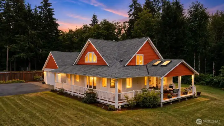 As twilight settles over the landscape, this remarkable home radiates warmth and timeless Northwest charm. The inviting wraparound covered porch, softly glowing windows, and striking architectural design create an unforgettable first impression, while the surrounding 2.26-acre park-like setting embraced by towering evergreens offers exceptional privacy and serenity. More than a home, it's a place you'll look forward to coming home to every single day. As twilight settles over the landscape, this remarkable home radiates warmth and timeless Northwest charm. The inviting wraparound covered porch, softly glowing windows, and striking architectural design create an unforgettable first impression, while the surrounding 2.26-acre park-like setting embraced by towering evergreens offers exceptional privacy and serenity. More than a home, it's a place you'll look forward to coming home to every single day.