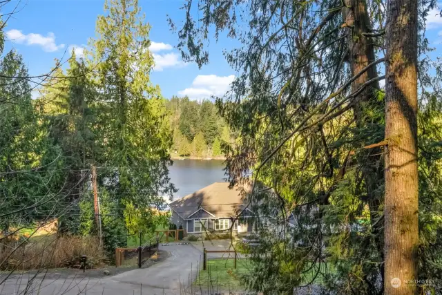 Be a part of the Crescent Lake Estates neighborhood where you can enjoy kayaking, fishing and the calm of lakeside living. This photo was taken from the low part of the lot.