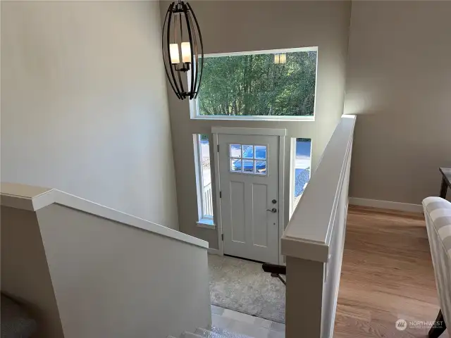 Large entry landing and wide stairwell. Transit window over entry door offers wonderful natural lighting.