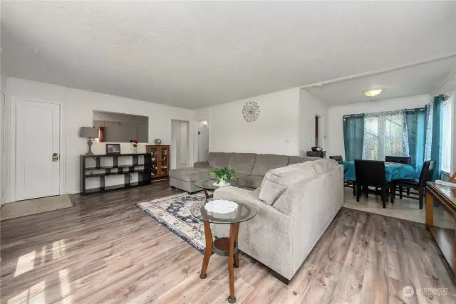 Upon entry is the living room with a dining area right next to it!