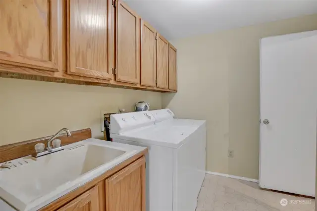 Neat and tidy laundry room.