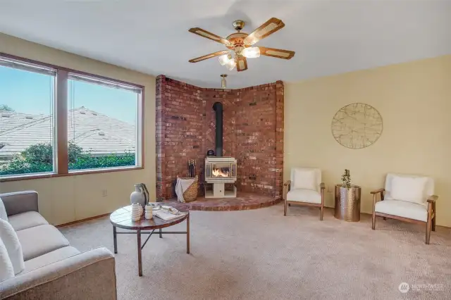 Cozy fireplace to gather around on chilly winter evenings.