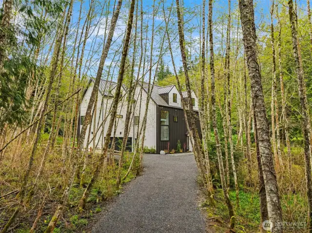 Welcome to 9243 Spargur Loop Road, tucked in the bucolic Port Madison neighborhood.