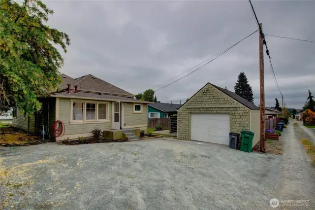 Back of house, garage, and alley.