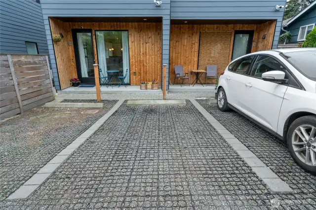 Private parking space off of alley equipped with EV Charger.