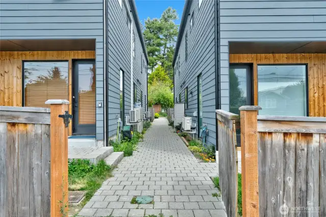 Gated entry from N 100th St. 914B is the back unit on the left.