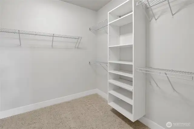 Walk-in closet with built in shelving (Photos from lot 9B)
