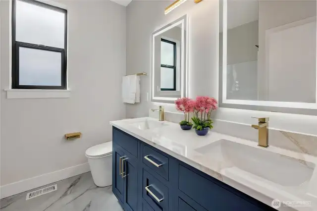 En-suite bath in primary (Photos from lot 9B, digitally staged)