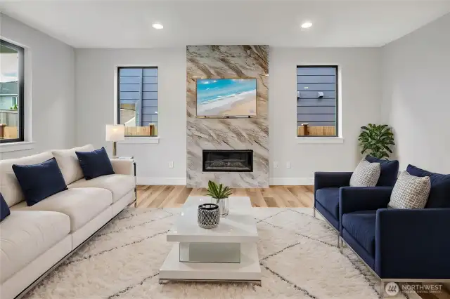Gas fireplace in living room (Photos from lot 9B, digitally staged)
