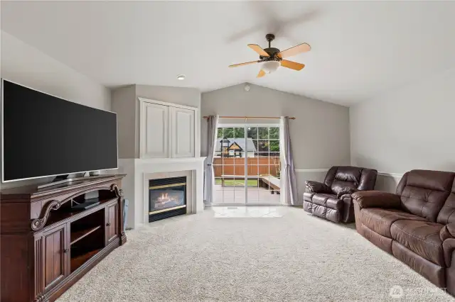 Access to the large back deck through the sliding doors.