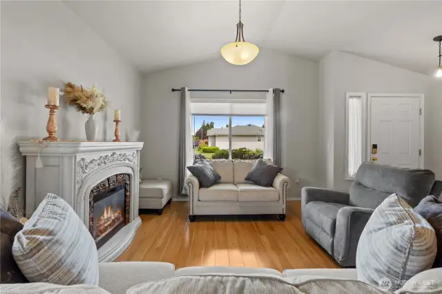 Upon entering the home you are greeted with tall ceilings and a formal living and dining space.