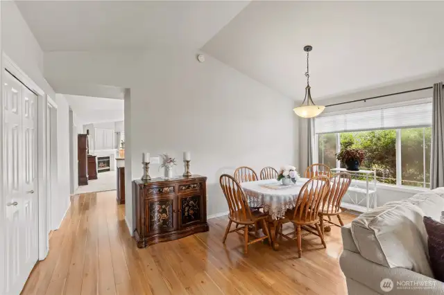 Dining room has a large window inviting in natural light.
