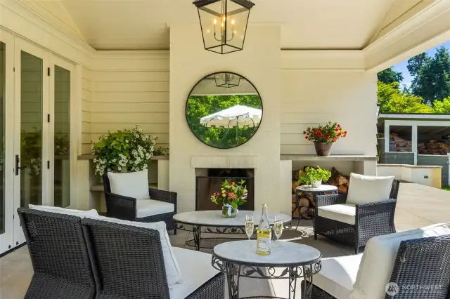 Inviting, cozy patio. Gather around the fireplace and take in the stunning view beyond.