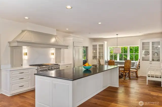 Alongside the spacious dining area, a cozy kitchen nook offers the perfect spot for everyday meals.
