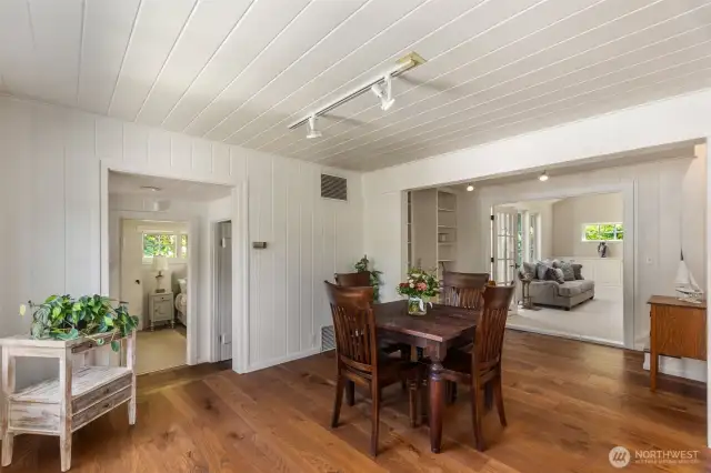 Second dining area featuring warm, inviting hardwood floors.