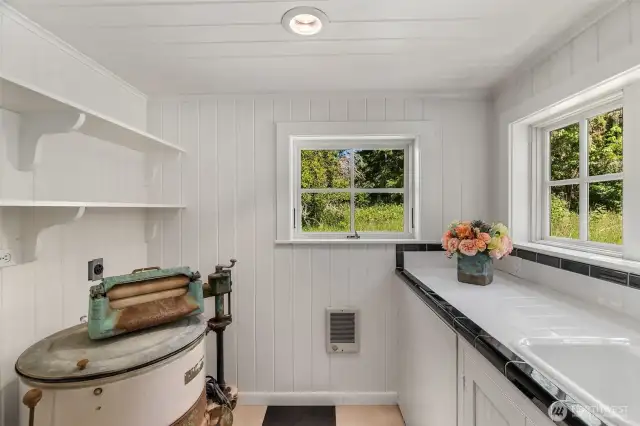 Second laundry room located in the east wing- no need to share the main Laundry area- offering more privacy.