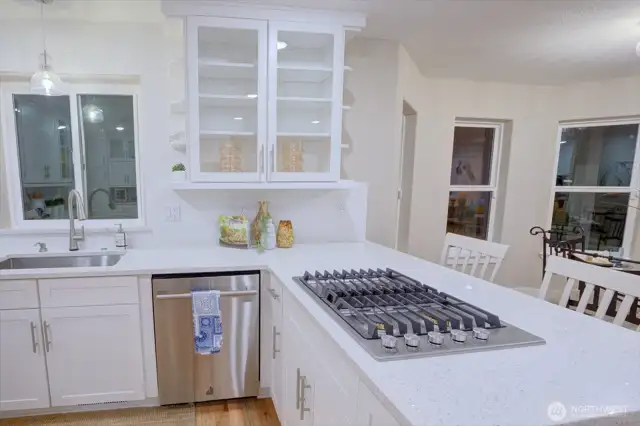 A cooktop allows the chef to cook and visit at the same time.