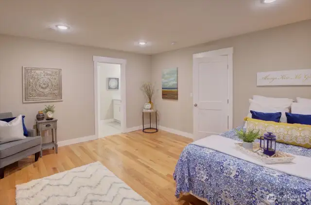 This is the Primary suite on the middle level. Very spacious, with sliding doors out to the deck for sweeping views!