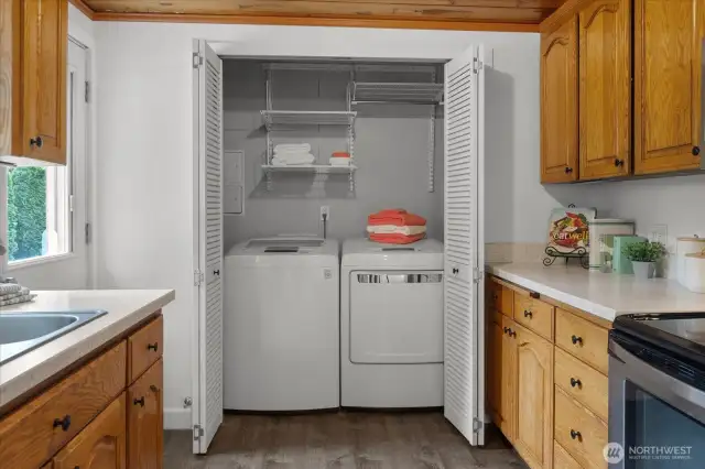 Convenient Laundry Area Closes away when not in use.