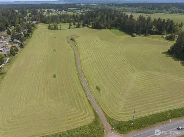 Your agricultural dream awaits! This 33-acre prime farmland offers immediate income potential, currently leased for hay, and is intelligently divided into 7 parcels for ultimate flexibility. Essential utilities are already installed, making it a truly turn-key opportunity.