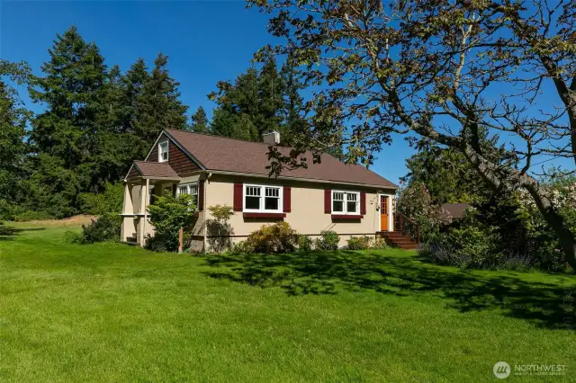 Charming Farmhouse with recent interior and exterior painting.